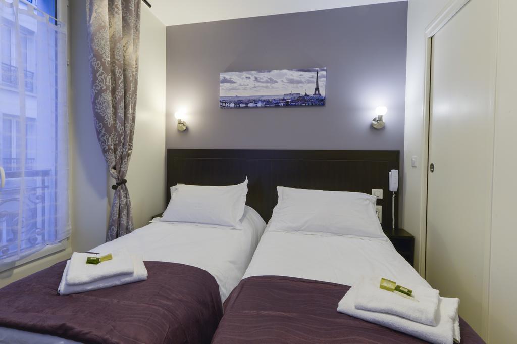 Hotel Du Quai De Seine Париж Стая снимка