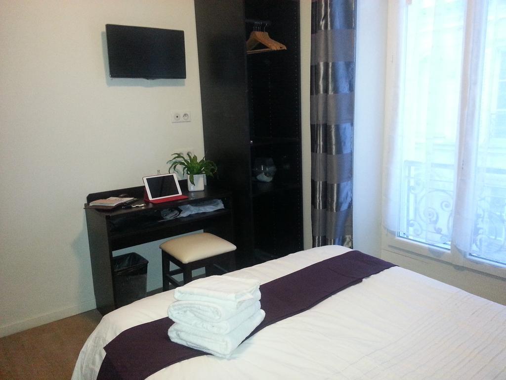 Hotel Du Quai De Seine Париж Стая снимка