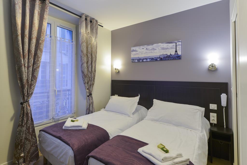 Hotel Du Quai De Seine Париж Стая снимка