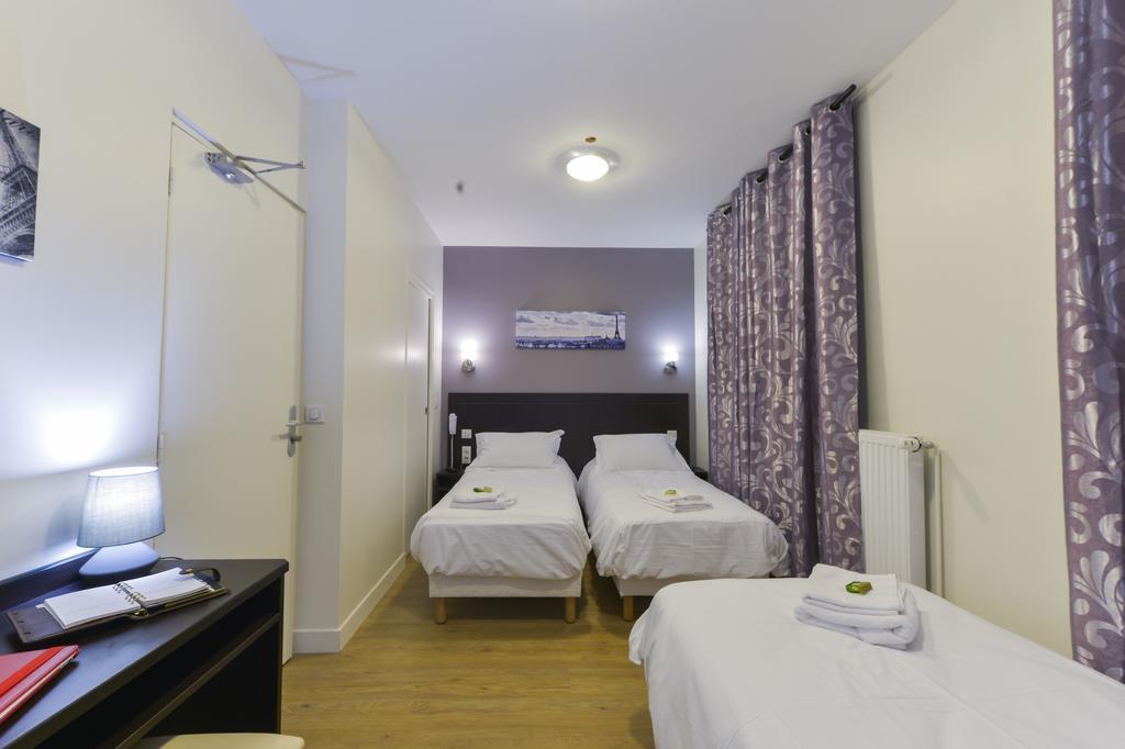 Hotel Du Quai De Seine Париж Стая снимка
